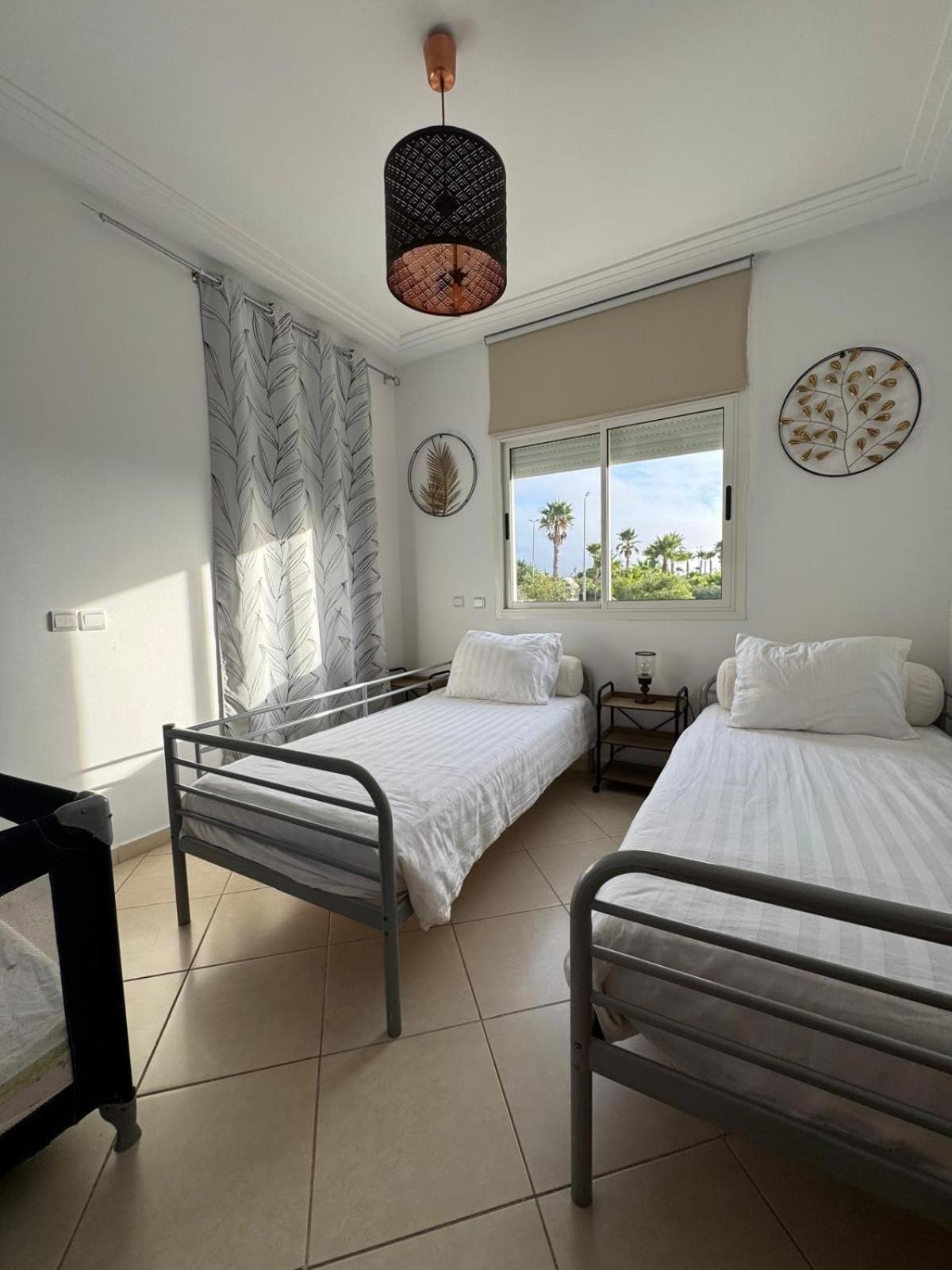 Marina Golf Asilah Apartment Bagian luar foto
